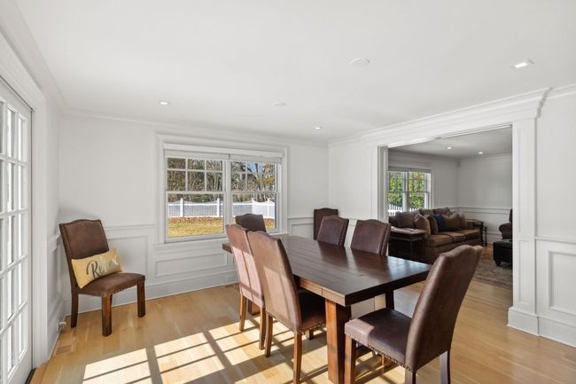 Dining area with light wood-type flooring and ornamental molding | Image 22
