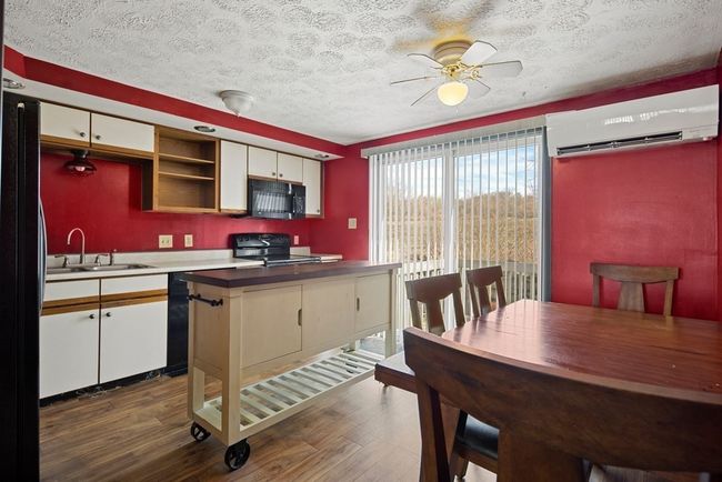 15 - 15 1 St St Ext, Condo with 2 bedrooms, 1 bathrooms and 3 parking in Wauregan CT | Image 4