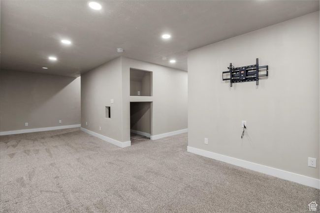 Finished basement featuring recessed lighting, carpet, and baseboards | Image 34