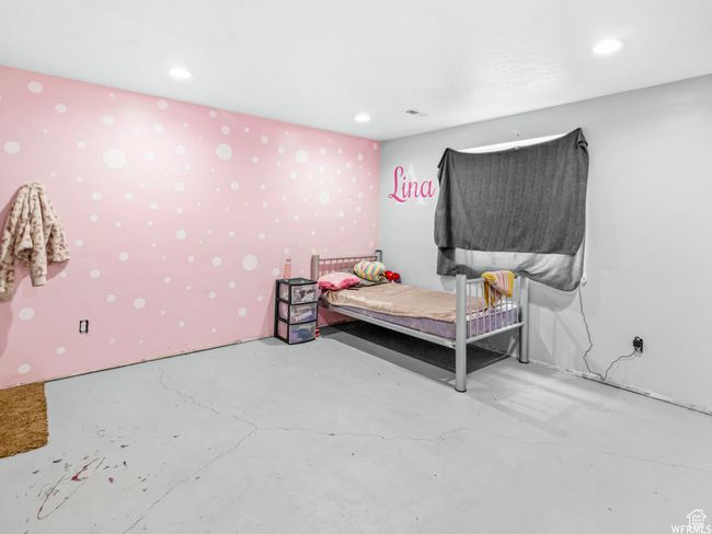 Bedroom featuring concrete floors and recessed lighting | Image 20