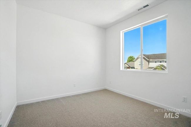 Empty room featuring carpet flooring and baseboards | Image 13