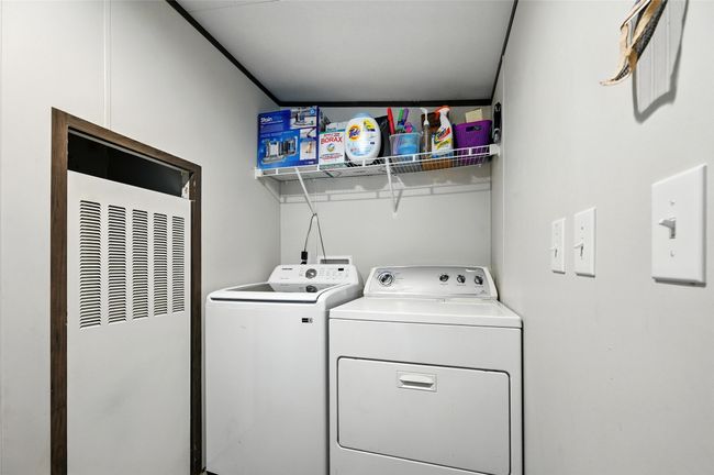 Laundry room with enough space for a full-sized washer and dryer | Image 4