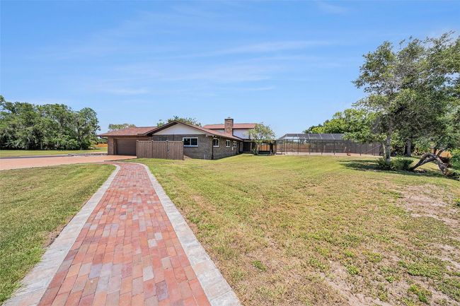 walkway to boat dock from house | Image 27