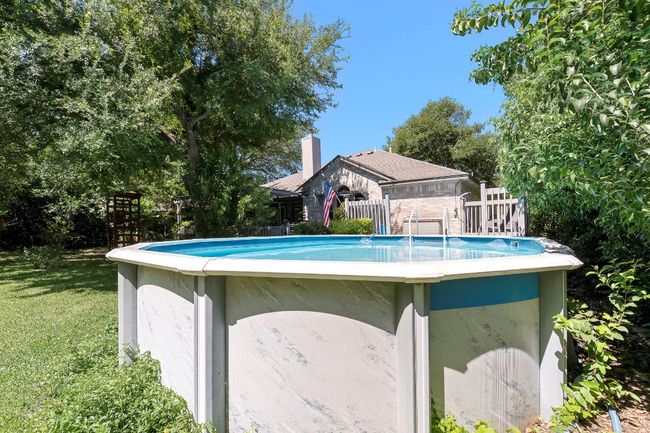 Above the ground pool in the back yard | Image 29