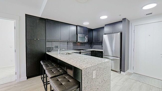 122 - 15 Aspenmont Hts Sw, Condo with 2 bedrooms, 2 bathrooms and 1 parking in Calgary AB | Image 6