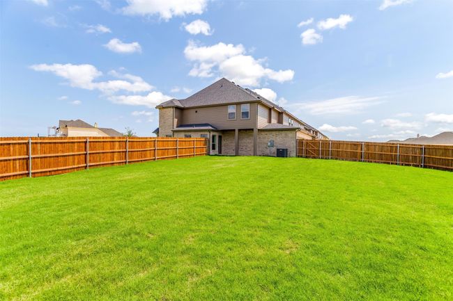 View of yard with central AC unit | Image 37