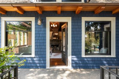 Step inside this charming Madrona home through a beautifully preserved entrance, blending historic character with modern comfort. | Image 1