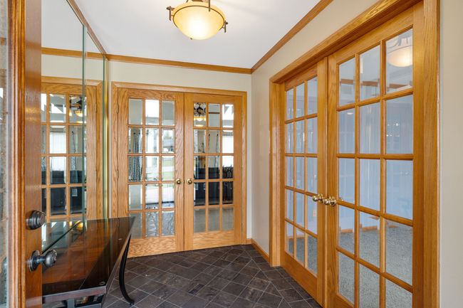 Spacious foyer with french doors to study | Image 4