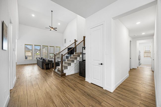 Laundry room located down the hall. | Image 14