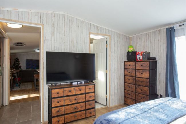 Bedroom featuring wood-type flooring | Image 11