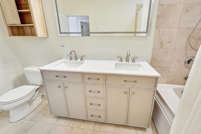 Primary bath new vanity, mirror and lighting. | Image 19