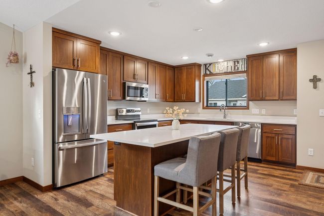 Large, center island perfect for storage and extra seating | Image 5