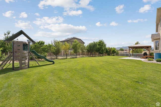 View of yard with a gazebo and a playground | Image 47