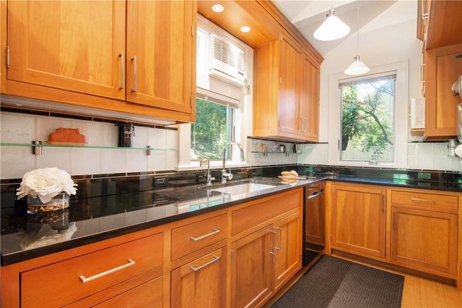 Renovated in 2012-2013 with custom cabinetry and granite countertops. | Image 11