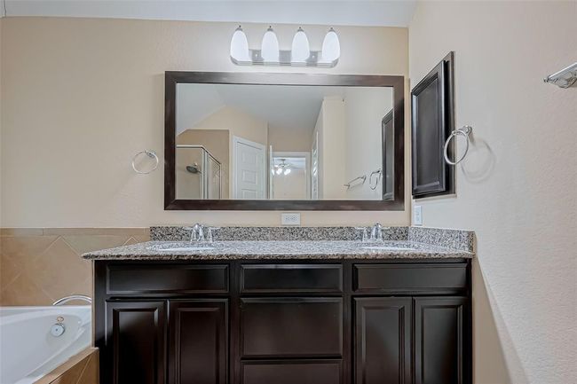 4914 Woodbury Mill Dr, House other with 4 bedrooms, 2 bathrooms and 2 parking in Spring TX | Image 25