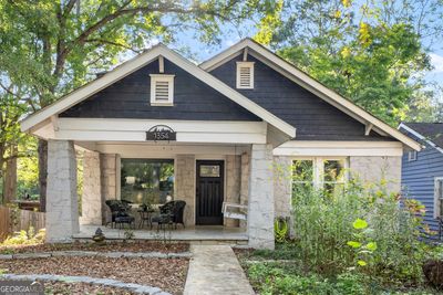 You can't miss this Charming Chosewood Park two story Home Steps from the Park! | Image 1