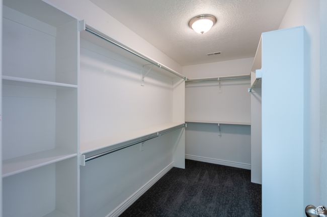 Large primary bedroom closet | Image 26