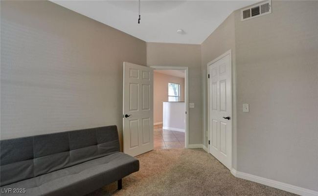 Unfurnished room with carpet flooring, visible vents, and baseboards | Image 16