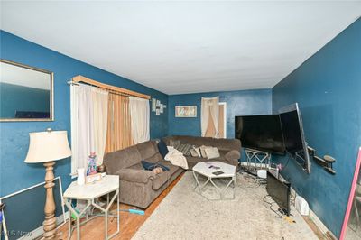 Living room featuring wood-type flooring | Image 2