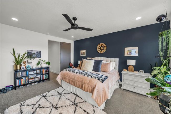 Carpeted bedroom with baseboards, ceiling fan, and recessed lighting | Image 21