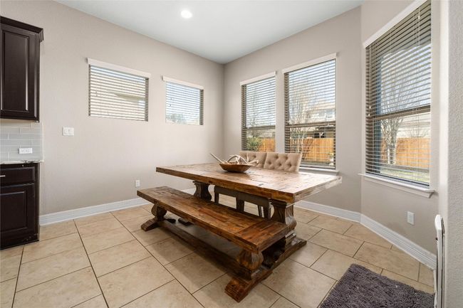Dining area with baseboards, recessed lighting, and light tile patterned floors | Image 12