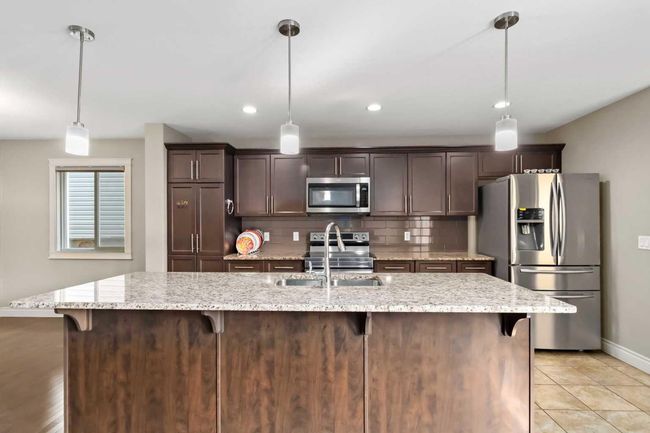 129 Coniker Crescent, House other with 5 bedrooms, 4 bathrooms and 2 parking in Fort Mcmurray AB | Image 15