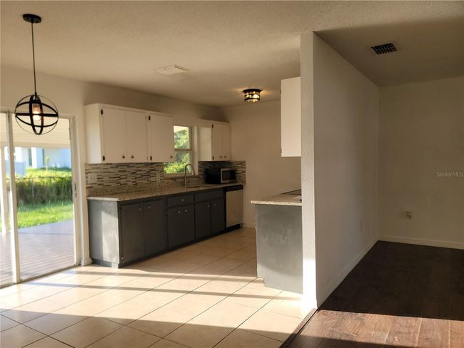 1203 Atlantic Ct, House other with 3 bedrooms, 2 bathrooms and null parking in Poinciana FL | Image 4