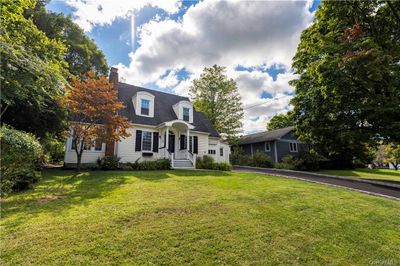 Cape cod house with a front lawn | Image 3