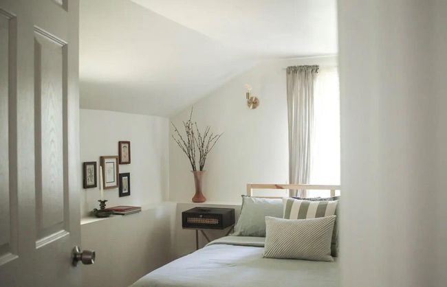Bedroom featuring lofted ceiling | Image 12