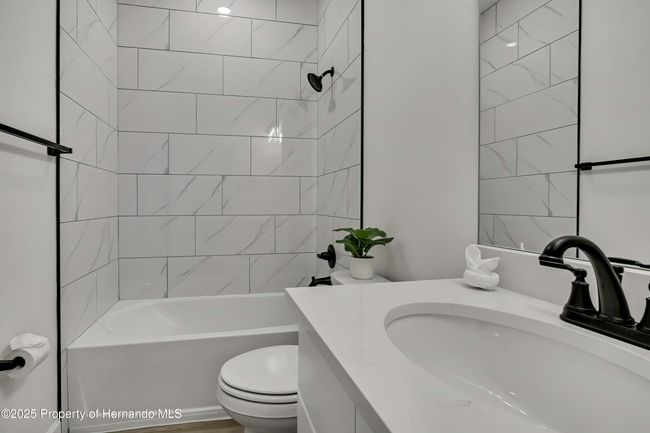 9739 Loretto St, House other with 4 bedrooms, 3 bathrooms and null parking in SPRING HILL FL | Image 33