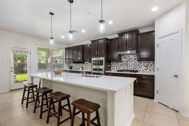 3404 Sophora Ct, House other with 5 bedrooms, 3 bathrooms and 4 parking in Round Rock TX | Image 4
