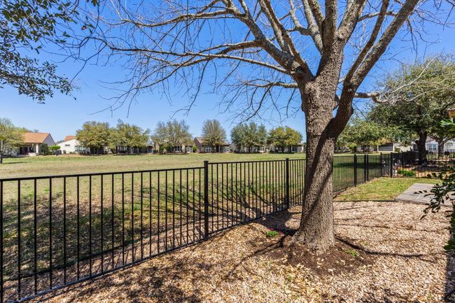View of yard with fence | Image 37