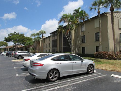 g2-703 Sunny Pine Way, Greenacres, FL, 33415-8960 | Card Image