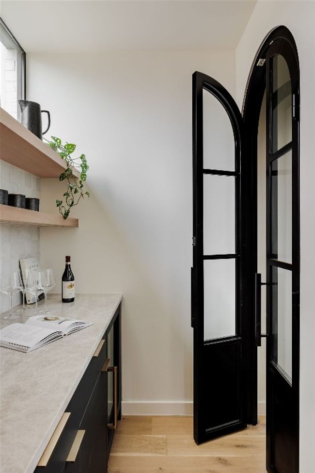 Bar featuring baseboards and light wood-style flooring | Image 16