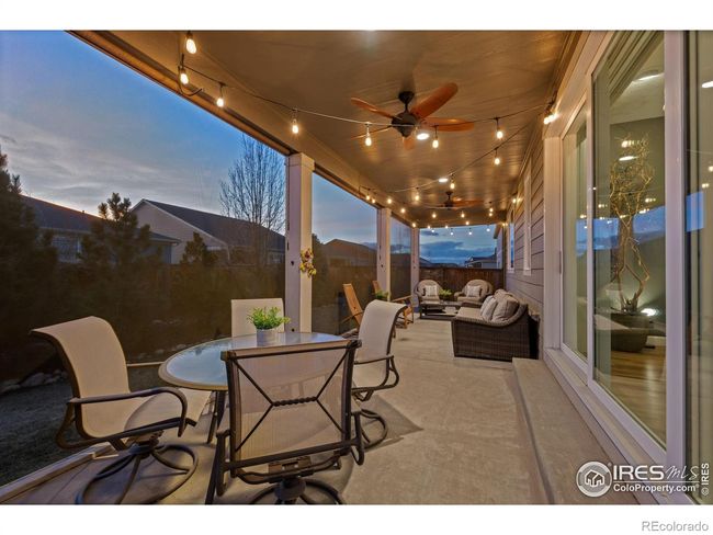 Screened-in patio is a great extension of the interior spaces of this home. | Image 29