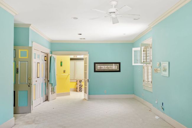 Unfurnished bedroom with ornamental molding and connected bathroom | Image 23
