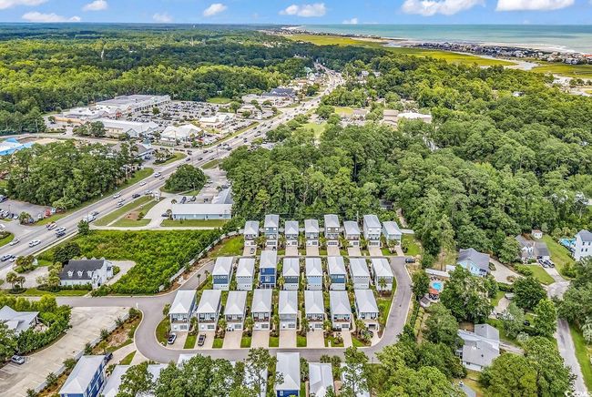View of property location with a forest and a nearby body of water | Image 34