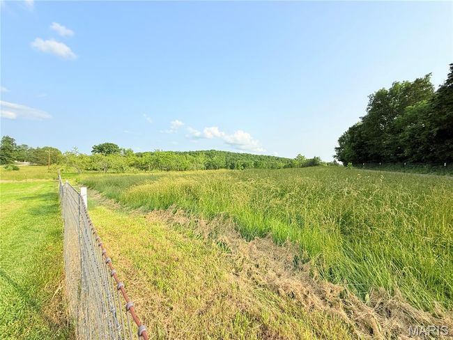 View of yard with a view of countryside | Image 43