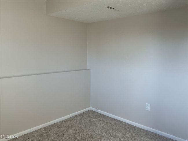 Spare room with carpet floors and a textured ceiling | Image 14