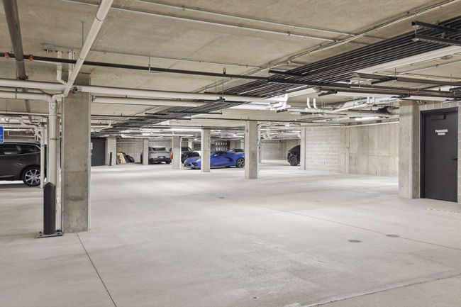 Two assigned parking spaces come with this unit, along with one storage locker in the garage (internal storage room in unit as well) | Image 22