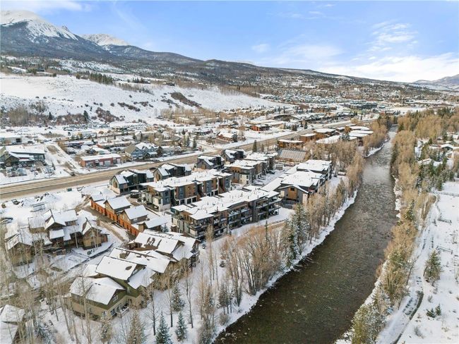 Snowy aerial view featuring a mountain view | Image 31