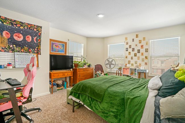 Bedroom featuring baseboards and carpet flooring | Image 21