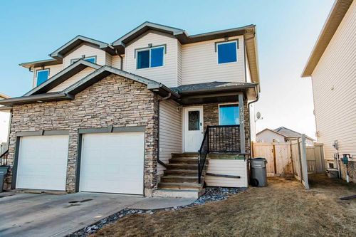 7029 112 Street, Home with 3 bedrooms, 1 bathrooms and 3 parking in Grande Prairie AB | Card Image