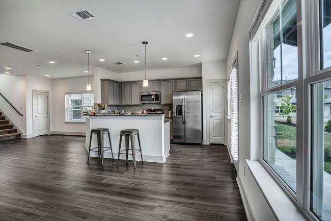 Eat-in kitchen with bar height overhang | Image 12