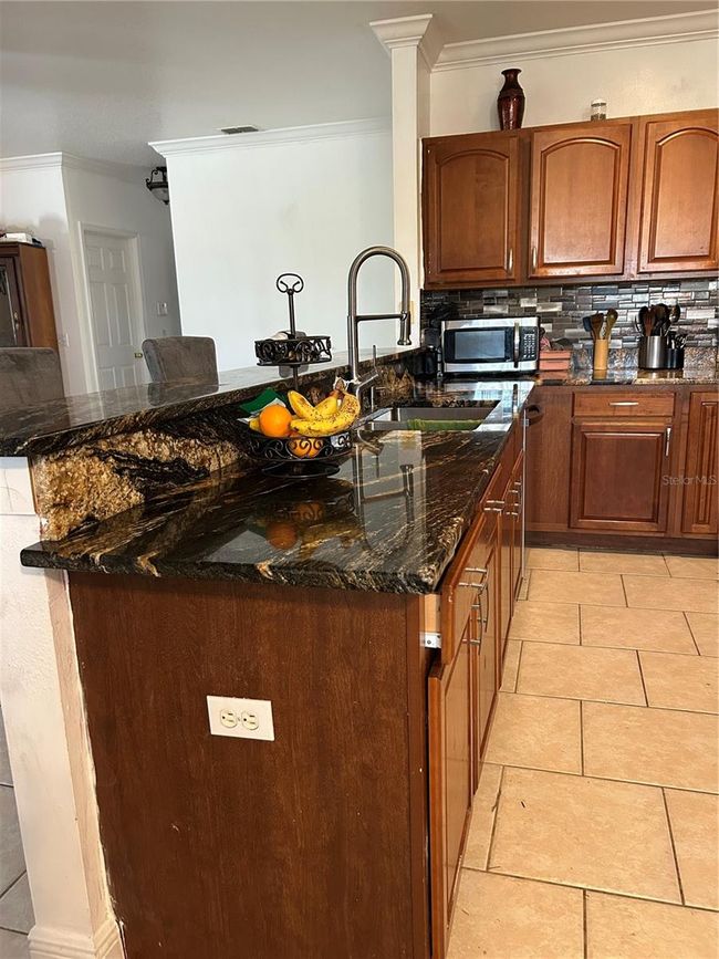 5406 Crepe Myrtle Cir, House other with 4 bedrooms, 3 bathrooms and null parking in KISSIMMEE FL | Image 24