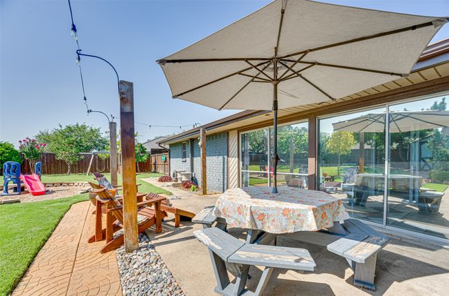View of patio featuring outdoor dining space | Image 31