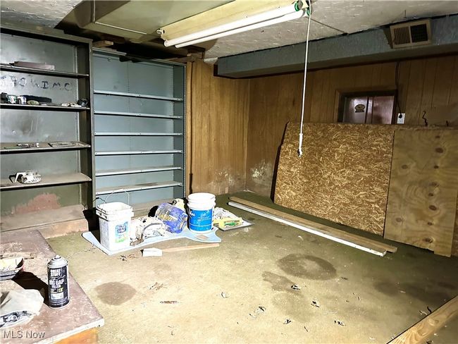 Finished below grade area with wood walls | Image 30