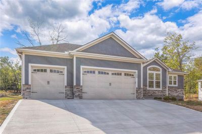 View of front of property featuring a garage | Image 3