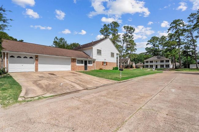 Side street entry 3 car garage | Image 34