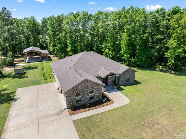 9241 Sage Forest Ln, House other with 3 bedrooms, 3 bathrooms and 2 parking in Pace FL | Image 49